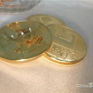 比特币破万美元